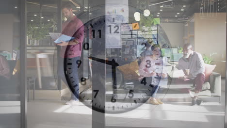 Animation-of-ticking-clock-against-view-of-diverse-people-working-at-office
