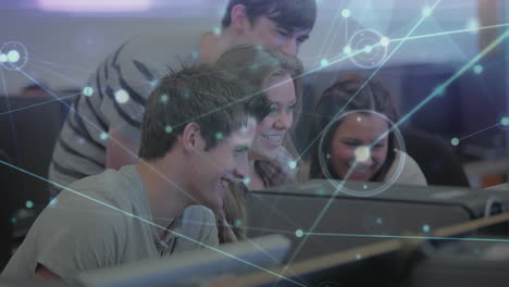 Animation-of-network-of-connections-over-group-of-students-using-computer-and-smiling-at-college