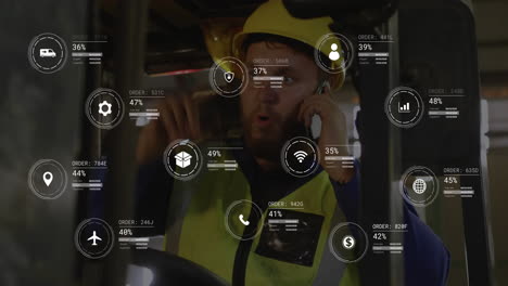 Animation-of-data-processing-on-biracial-male-worker-talking-on-smartphone-in-forklift-at-warehouse