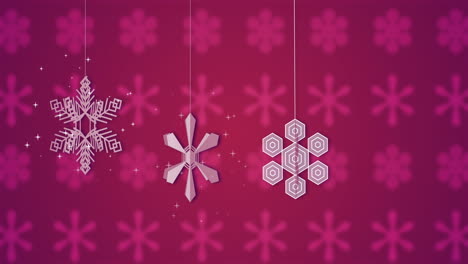 Animation-of-white-snowflakes-spinning-on-pink-background