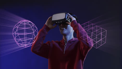 Animation-of-glowing-3d-shapes-of-data-transfer-over-asian-man-in-vr-headset