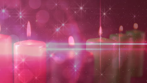 Animation-of-stars-and-light-spots-over-candles-at-christmas