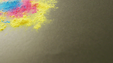 Video-of-multi-coloured-powders-with-copy-space-on-black-background