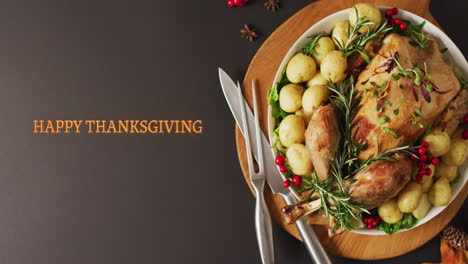 Animation-of-happy-thanksgiving-text-and-dinner-on-table-background