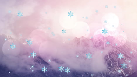 Animation-of-snowflakes-falling-against-landscape-with-snow-covered-mountains