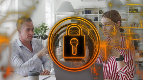Animation-of-security-padlock-icon-against-group-of-diverse-colleagues-discussing-at-office