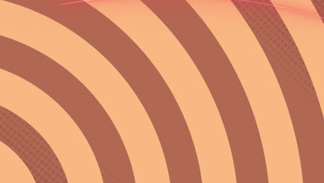 Animation-of-brown-stripes-spinning-on-seamless-loop