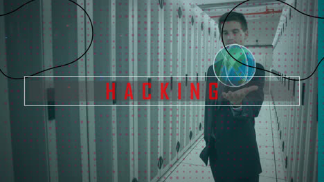 Animation-of-hacking-text-banner-over-caucasian-businessman-holding-invincible-object-in-server-room