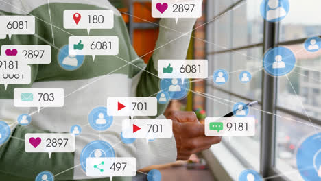 Animation-of-social-media-icons-and-numbers-with-connections-over-biracial-man-using-smartphone