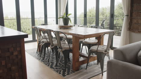 General-view-of-dining-room-with-table-and-chairs,-slow-motion