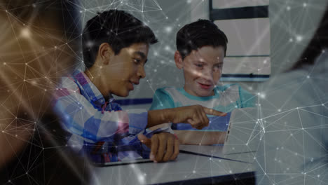 Network-of-connections-against-two-diverse-boys-using-digital-tablet-in-the-class-at-school