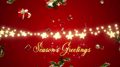 Animation-of-seasons-greetings-text-and-fairy-lights-against-christmas-gifts-and-decorations