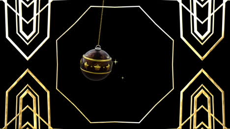 Swinging-black-and-gold-christmas-bauble-over-gold-kaleidoscopic-pattern-on-black-background