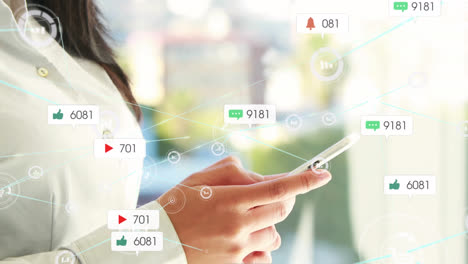 Animation-of-social-media-icons-and-numbers-with-connections-over-asian-woman-using-smartphone