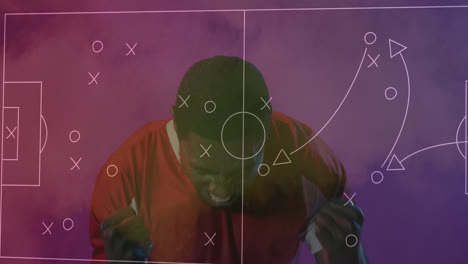 Animation-of-football-game-tactical-diagram-over-cheering-african-american-male-football-fan