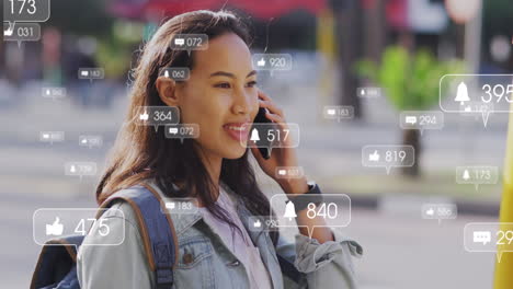 Animation-Der-Datenverarbeitung-In-Sozialen-Medien-über-Eine-Asiatische-Frau,-Die-In-Der-Stadt-Ein-Smartphone-Verwendet
