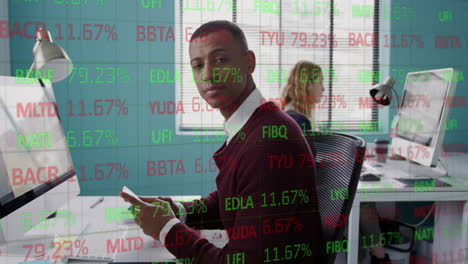 Animation-of-stock-market-data-processing-over-biracial-man-using-smartphone-smiling-at-office