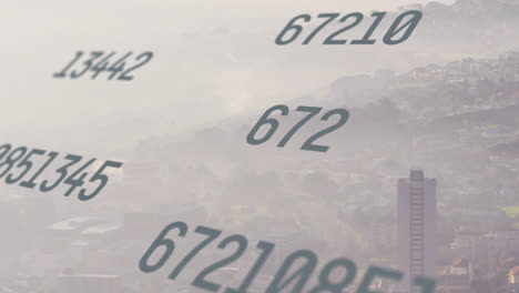 Animation-of-changing-numbers-over-aerial-view-of-fog-covered-modern-city-against-sky