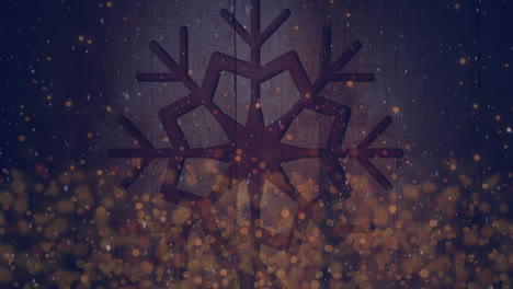 Animation-of-snow-falling-and-light-spots-over-snowflakes-on-wooden-background