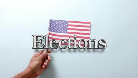 Animation-of-elections-text-over-flag-of-united-states-of-america-on-blue-background