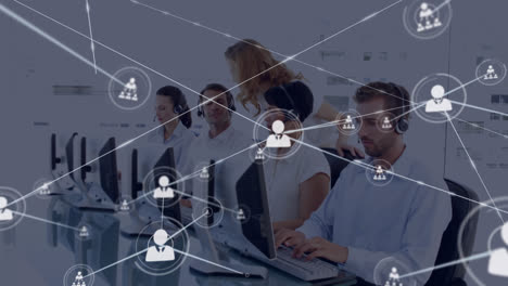 Animation-of-connected-icons,-caucasian-female-manager-assisting-customer-representatives-in-office