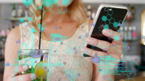 Animation-of-network-of-digital-icons-over-mid-section-of-caucasian-woman-using-smartphone-at-a-bar
