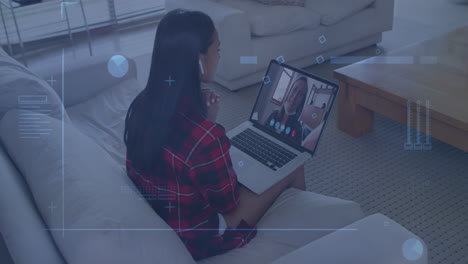 Animation-of-digital-screen-with-diverse-data-over-biracial-woman-having-video-call-on-laptop