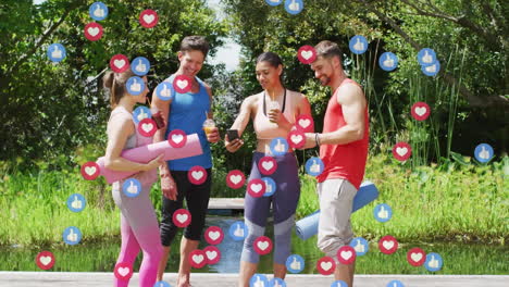 Animation-of-social-media-icons-over-group-of-diverse-fit-people-using-smartphone-in-the-park