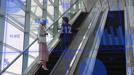 Animation-of-data-processing-against-diverse-man-and-woman-discussing-on-escalator-at-office