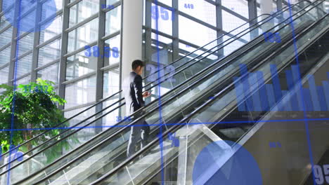 Animation-of-data-processing-against-caucasian-businessman-using-smartphone-on-escalator-at-office