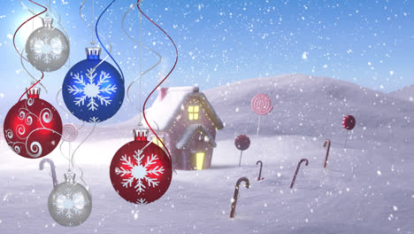 Animation-Von-Weihnachtskugeln-über-Haus-Und-Winterlandschaft