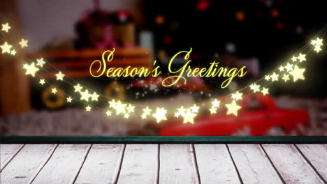 Animation-of-christmas-season's-greetings-over-star-shaped-fairy-lights