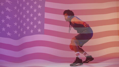 Animation-Der-Amerikanischen-Flagge-über-Einem-Afroamerikanischen-Männlichen-Basketballspieler,-Der-Mit-Einem-Ball-Springt