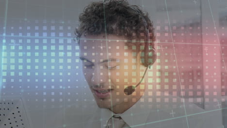 Animation-of-square-gradient-pattern-against-biracial-man-talking-on-phone-headset-at-office