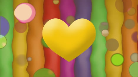 Animation-of-yellow-heart-icon-breaking-and-colorful-spots-against-colorful-striped-background