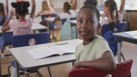 African-American-girl-in-a-classroom-setting,-with-copy-space