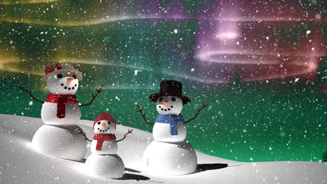 Animation-of-falling-snow-over-family-of-snowmen-and-winter-scenery
