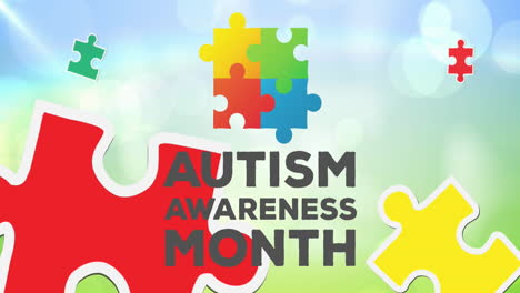 Animation-of-autism-awareness-month-text-and-multi-coloured-puzzle-pieces