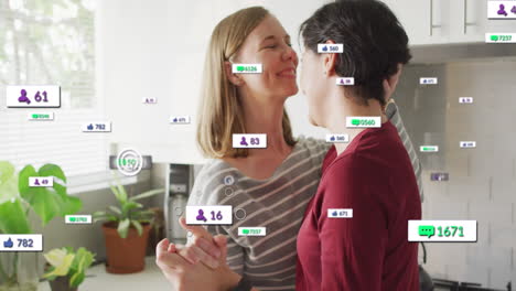 Animation-of-social-media-icons-and-numbers-over-lesbian-caucasian-couple-at-home