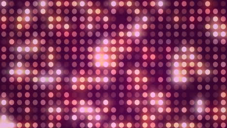 Animation-of-grid-of-pulsating-pink-and-orange-circular-lights