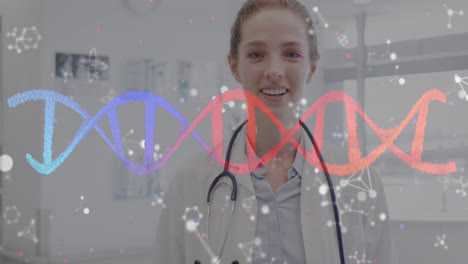 Animation-of-dna-strand-and-molecules-over-happy-caucasian-female-doctor-with-stethoscope