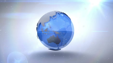 Animation-of-spinning-globe-and-light-spots-against-blue-background-with-copy-space