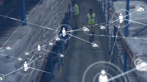 Animation-of-network-of-digital-icons-against-african-american-male-worker-walking-at-warehouse