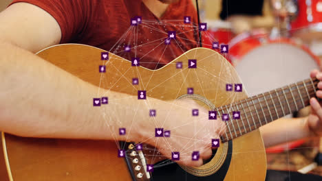 Animation-of-globe-with-network-of-connections-and-icons-over-caucasian-man-playing-guitar