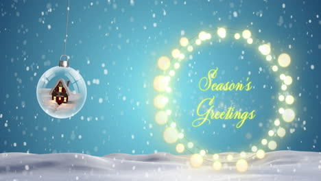 Animation-of-snow-falling-over-hanging-snowball-and-seasons-greetings-text-over-fairylights-banner