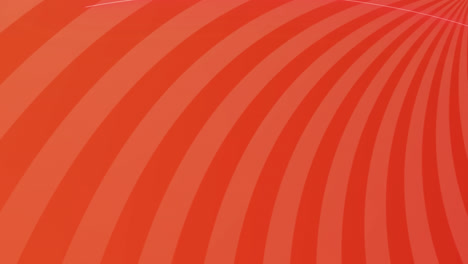 Animation-of-orange-stripes-spinning-on-seamless-loop