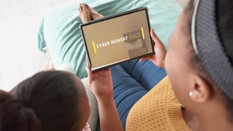 Afroamerikanische-Mutter-Und-Tochter-Nutzen-Tablet,-Online-Shopping-Am-Cyber-Monday,-Zeitlupe