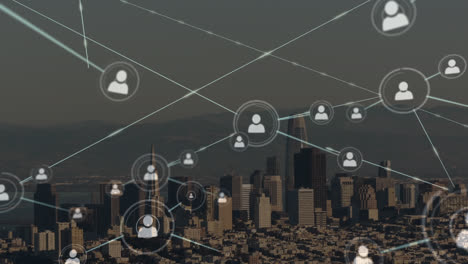 Animation-of-network-of-profile-icons-against-aerial-view-of-cityscape