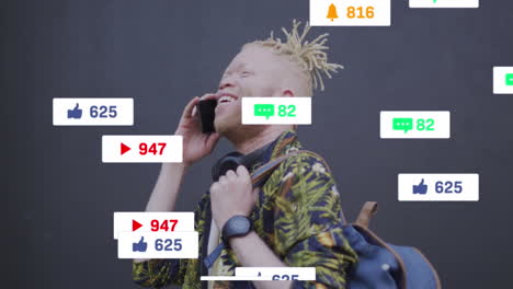 Animation-of-social-media-data-processing-over-albino-man-on-smartphone