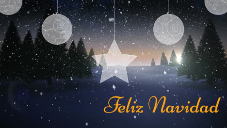 Animation-of-snow-falling-over-feliz-navidad-text-and-hanging-decorations-against-winter-landscape